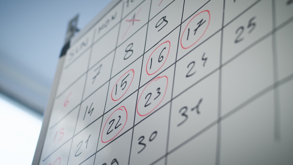 a calendar on the whiteboard